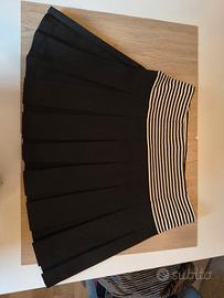 Gonna a pieghe elastica