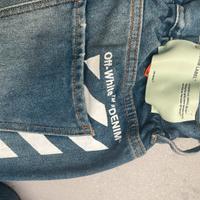 Jeans slim fit low crotch con cintura “belt”