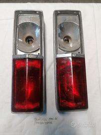 Auto d'epoca fanali Fiat 124 automobile