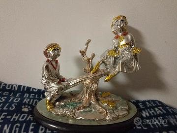Scultura Argentata "Bambini sull'Altalena" Vintage