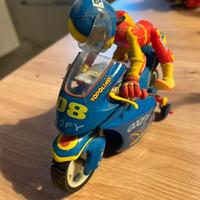 Pippo in moto di topolino