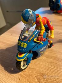 Pippo in moto di topolino