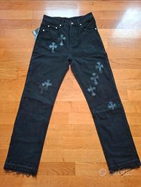 Jeans chrome hearts neri con toppe a croci nere