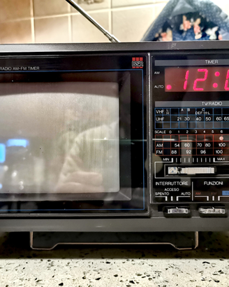 TV Color 5,5" con Radio AM-FM e Timer