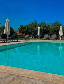 Appartamenti in villa con piscina