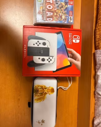 Nintendo switch oled + 6 giochi + custodia