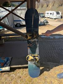 Tavola snowboard capita doha con attacchi