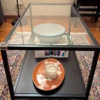 Tavolino da salotto in vetro e metallo nero