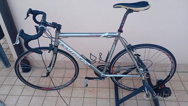 Bibi da corsa Corratec e rullo Btwin 100