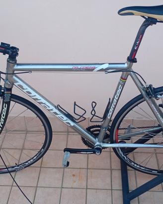 Bibi da corsa Corratec e rullo Btwin 100