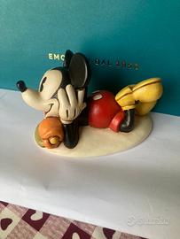 Topolino disteso con tulipano Thun Disney