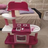 Cucina con forno e lavatrice