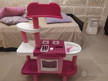 Cucina con forno e lavatrice