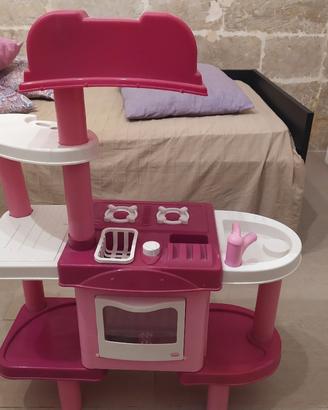 Cucina con forno e lavatrice