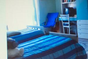 Stanze singole/doppie in appartamento