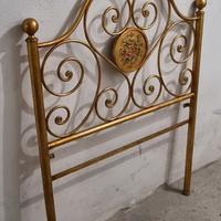 Testata in ferro battuto