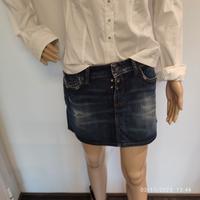 Minigonna jeans a vita bassa con rotture Replay