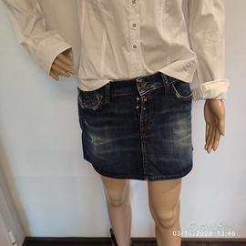 Minigonna jeans a vita bassa con rotture Replay