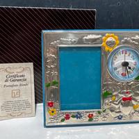 Cornice con orologio