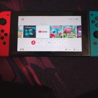 Nintendo switch con custodia e giochi