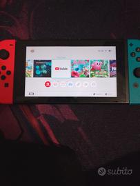 Nintendo switch con custodia e giochi