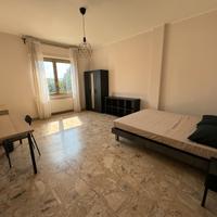 Stanza Singola con Letto Matrimoniale