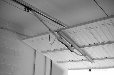 Braccio oscillante per porta del garage Nuovo