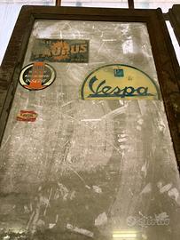 Vecchie porte d’epoca officina moto