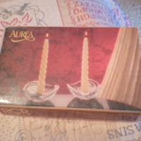 porta candele in vetro con candele 