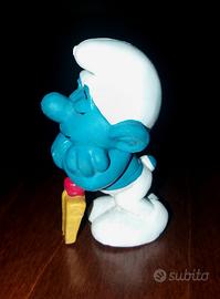 Puffo che dorme con pala