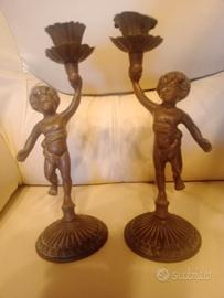 Coppia di candelabri  in metallo