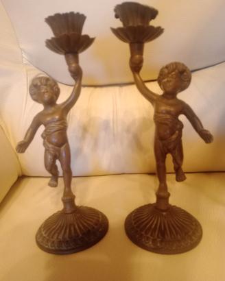 Coppia di candelabri  in metallo