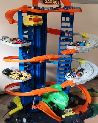 parcheggio Hot Wheels con dinosauro