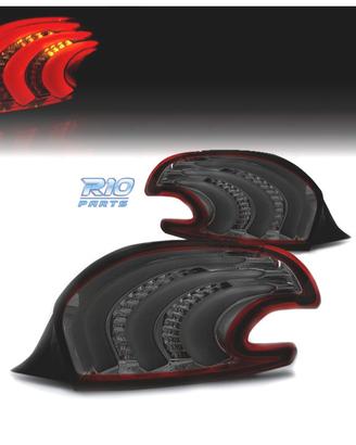 FANALI PER PEUGEOT 208 12-15 LIGHT BAR ROSSO FUMÉ