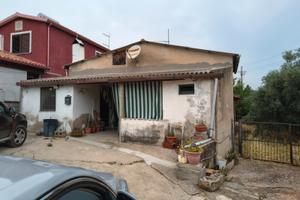Trivano con giardino e rimessa