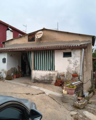Trivano con giardino e rimessa