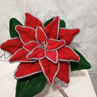 stella di Natale realizzata a uncinetto con vaso i