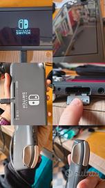Nintendo Switch Lite con caricatore + gioco