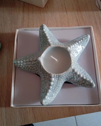 stella marina in ceramica con candela 
