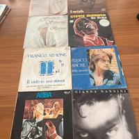8 dischi in vinile 45 giri
