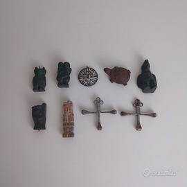 Lotto 9 pendenti e statuette etniche 