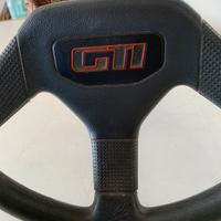 Volante con piantone 205 gti