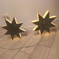 Due stelle luminosi luminarie Luci