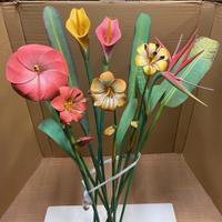 FIORI IN LEGNO INTAGLIATO.