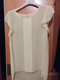 blusa gialla con maniche a volant 