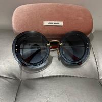 Occhiali MIU MIU in forma rotonda da donna