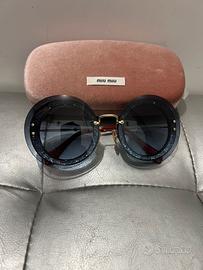 Occhiali MIU MIU in forma rotonda da donna