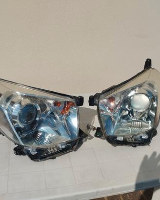 fari fanali proiettori Toyota iQ 