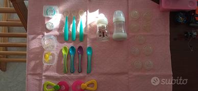 set primo anno , biberon, cucchiaino, ciucci