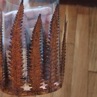 vaso con felci decorative